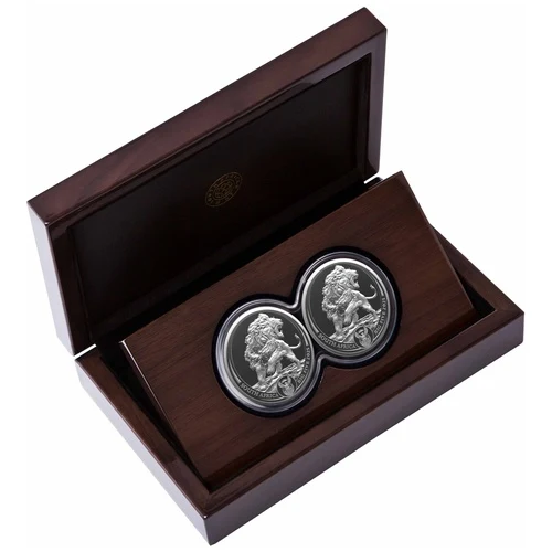 The 2025 Big Five Silver Lion Double Capsule Set is a two-ounce .999 fine silver set from the South African Mint, featuring two Series III lion proof coins paired in a dual display to complete the signature split-face design.