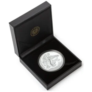 The 2025 2 oz Silver Odyssey "Bateleur Eagle" Proof Coin is the R10 legal tender inaugural release in the SA Mint Odyssey of the Sky seven-coin wildlife series. It depicts a dramatic wide-angle perspective of a Bateleur eagle extending its talons to grasp its prey, framed by a background inspired by traditional local isishweshwe blueprint cloth patterns.