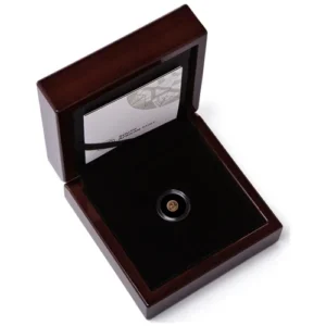 The 2026 1/50th oz Proof Gold Krugerrand is a 0.679-gram 22-karat (.9167 fine) proof gold coin from the South African Mint, featuring the classic Paul Kruger obverse, springbok reverse, and an 8.00 mm miniature profile as the world's smallest official Krugerrand release.
